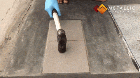 smash hammer on ceramic tile