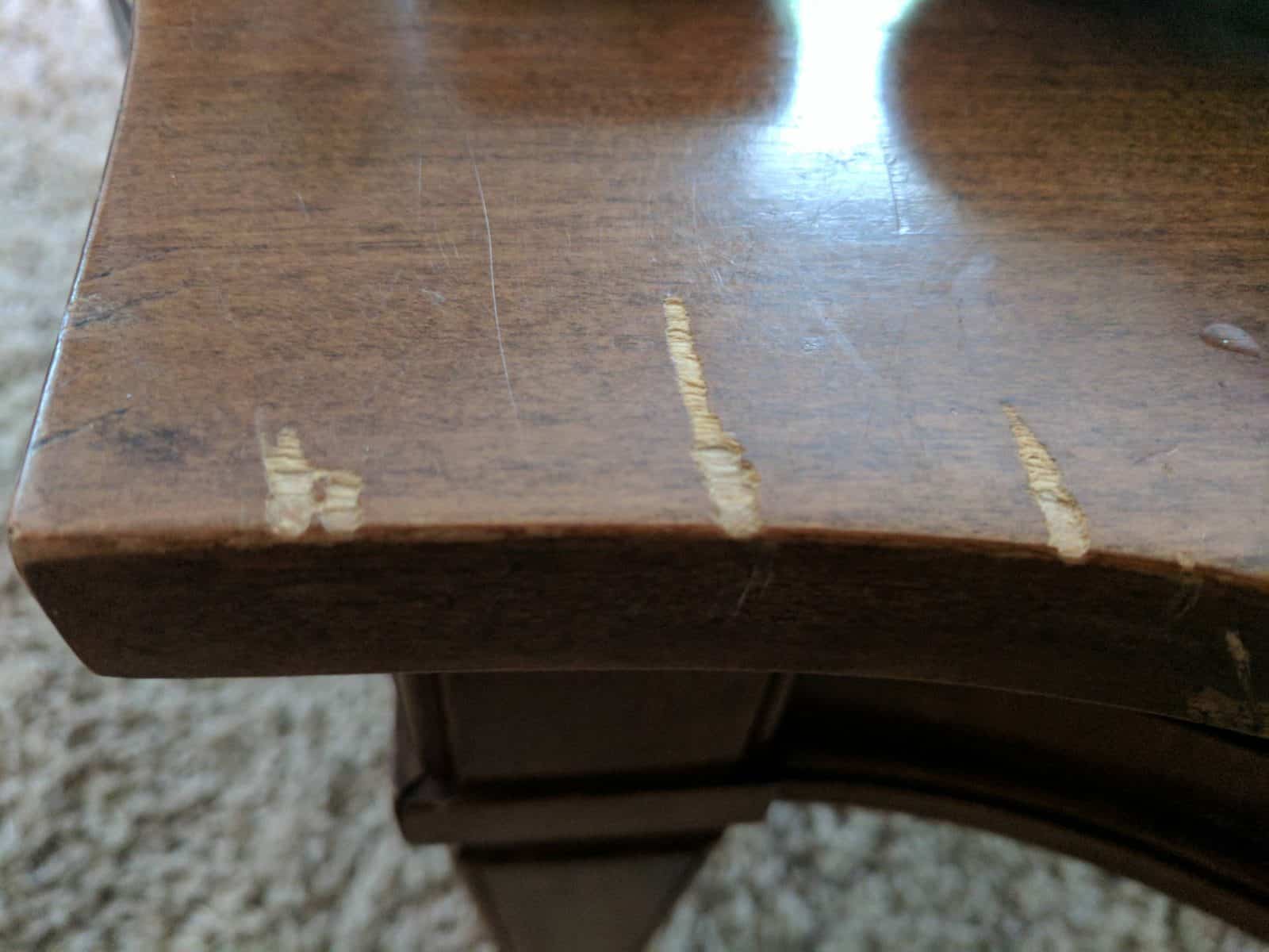 deep scratch on wood desk